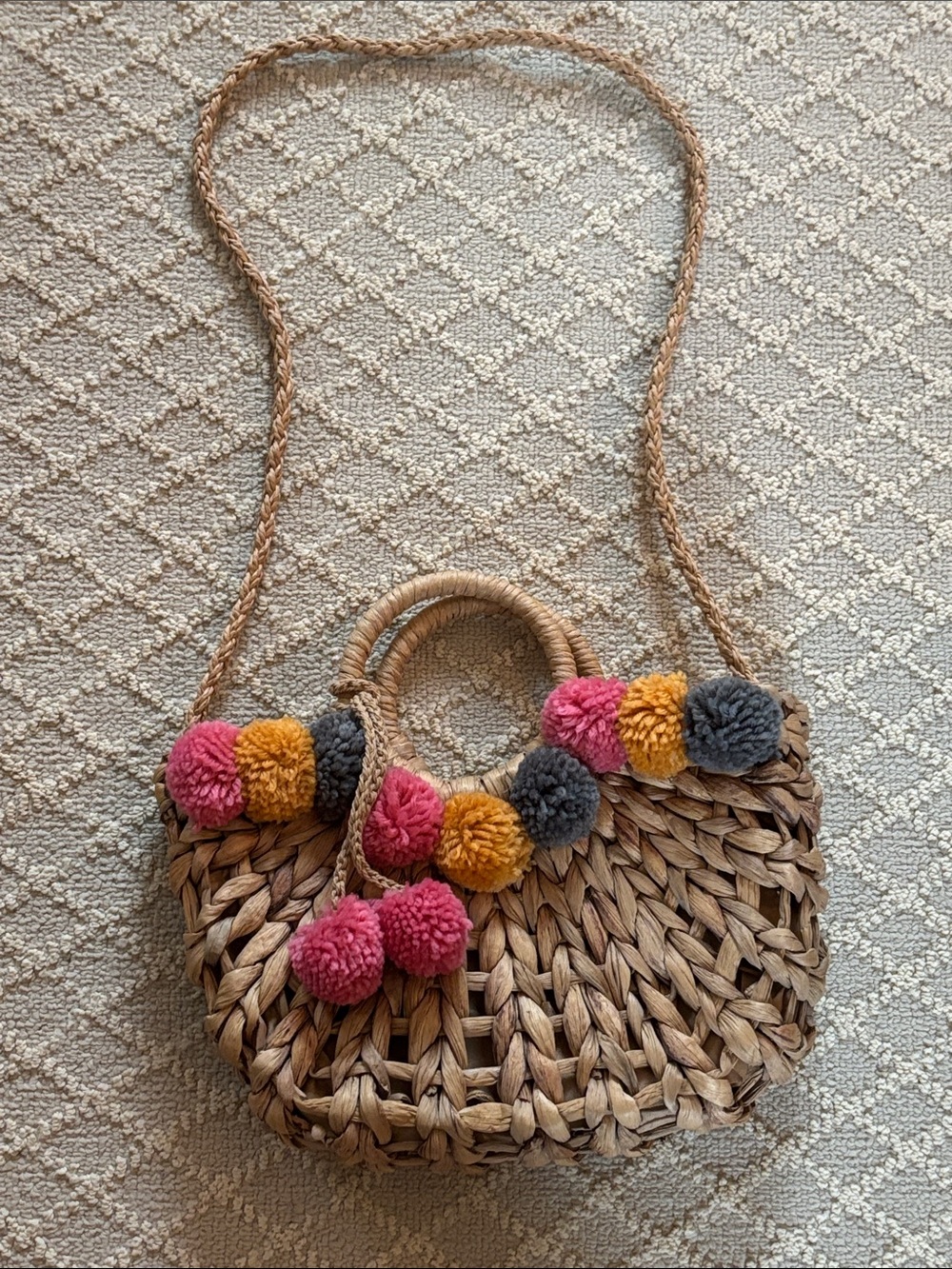 Woven Straw Crossbody Bag with Pink, Mustard & Gray Pom Poms